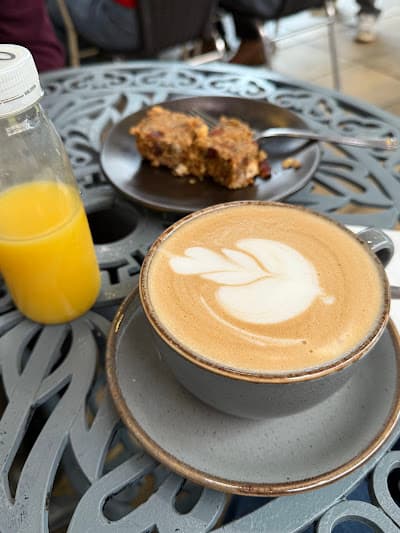 Coffee bar with matte finishes and greenery